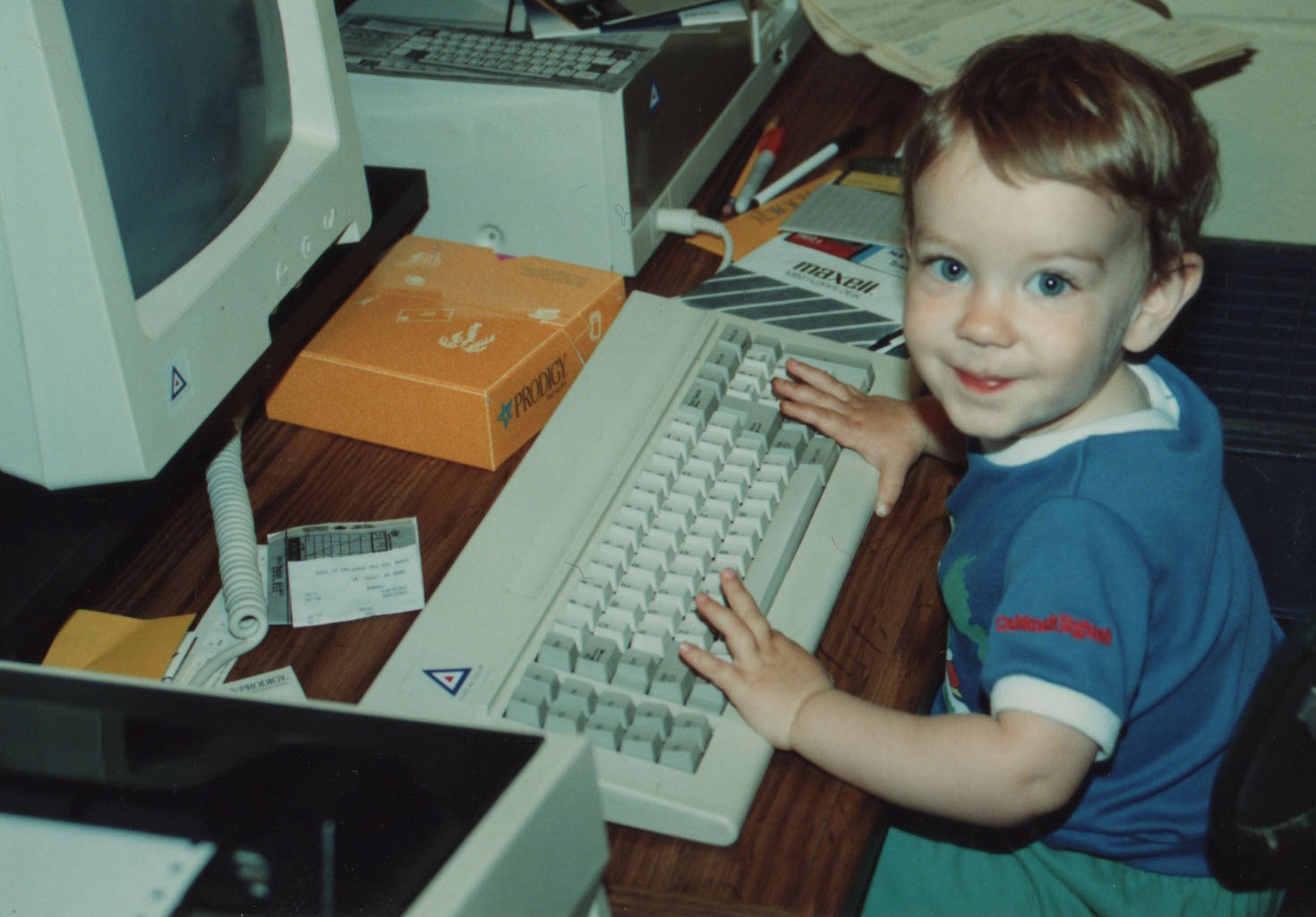 Dan as a toddler at a computer